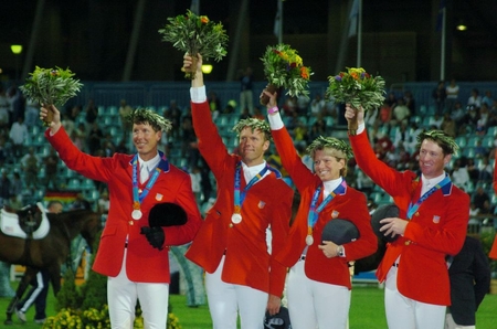 Peter Wylde second from left and Chris Kappler left Beezie Madden IHSA Hall of Famer and McLain Ward were the gold medal winning Team USA at the 2004 Athens Olympic Games. Photo by Diana DeRosa 