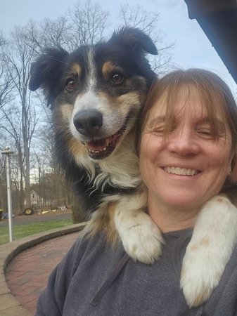 candid girl dog heas to head Hirth