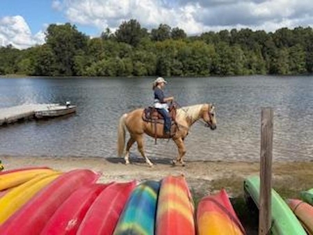 candid man on palaomino canoes Dankonich