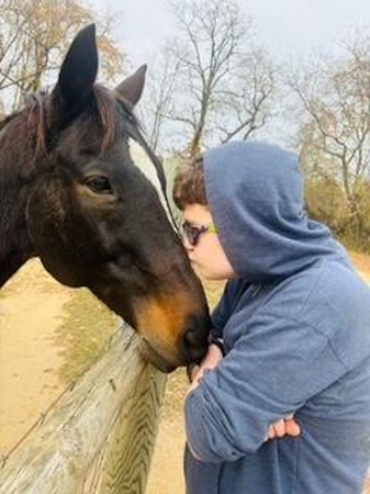 candid woman kissing horse Forsyth
